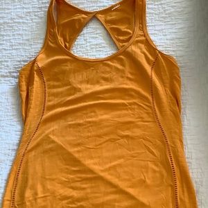 Work out in this Stylish and chic tank top with super attractive back